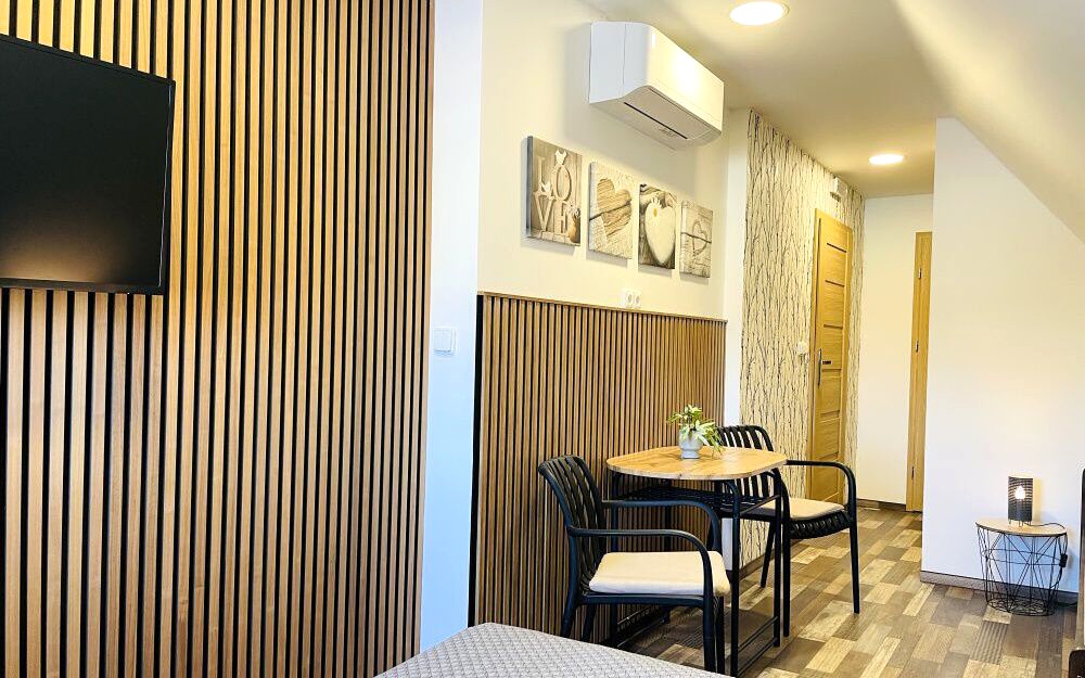 Podkrovní třílůžkové pokoje